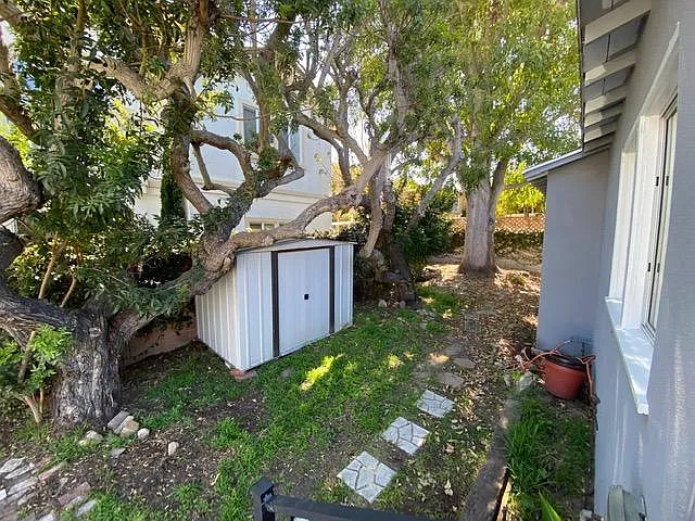Shed is included for added storage. Nice large trees are also included ;)