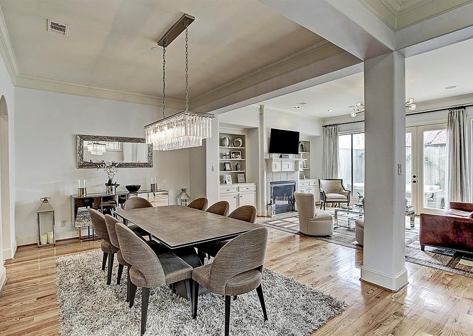 Soaring ceilings and open floor plan on the first floor with light flooding in from the back yard