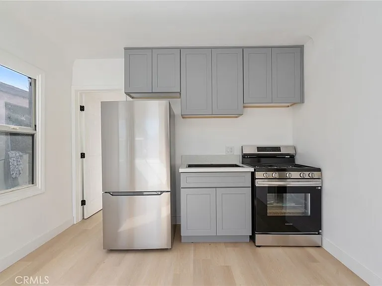 242 1/2 E 84th St #TOWNHOUSE — Photo 1