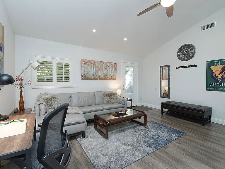 View to the main private entrance across the lounge space to the door.