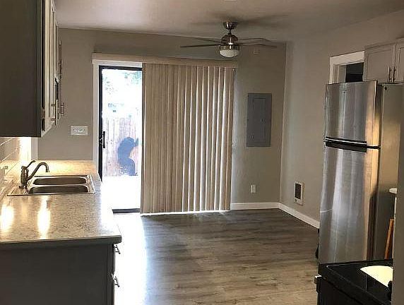 Kitchen- the 3rd bedroom is past the fridge to the right
