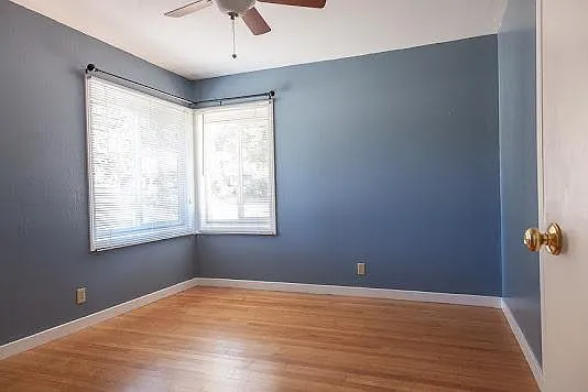 Bed room located in the front of the house near front entrance. Its closet is located on the right behind the visible door handle
