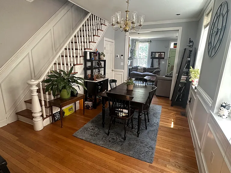 Original banister leading to the second floor, dining room, 2024