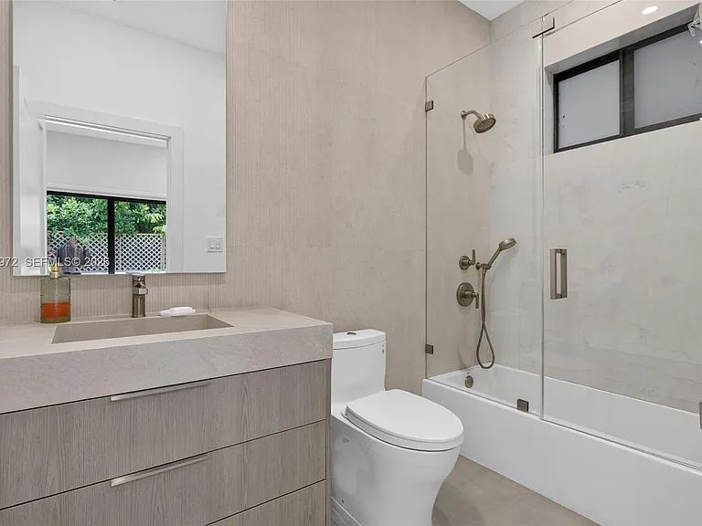645 NE 53rd St — Photo 38