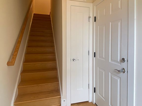Private foyer with coat closet and garage access