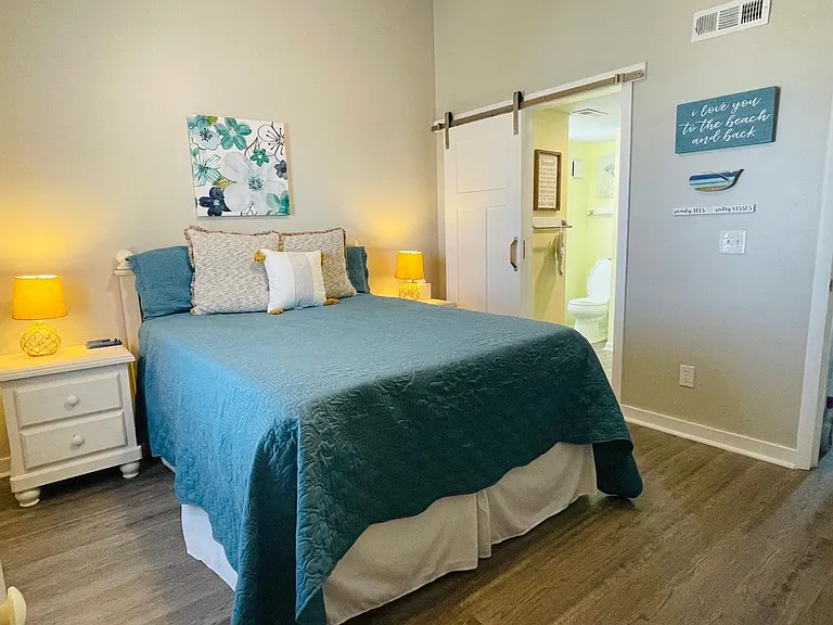 Master Bdrm with barn door to bathroom