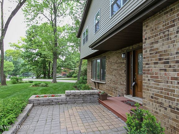 Paver walk and flower beds.