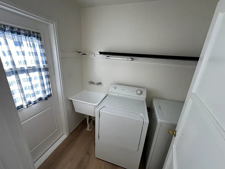 Dedicated laundry room with wash basin (washer/dryer included)