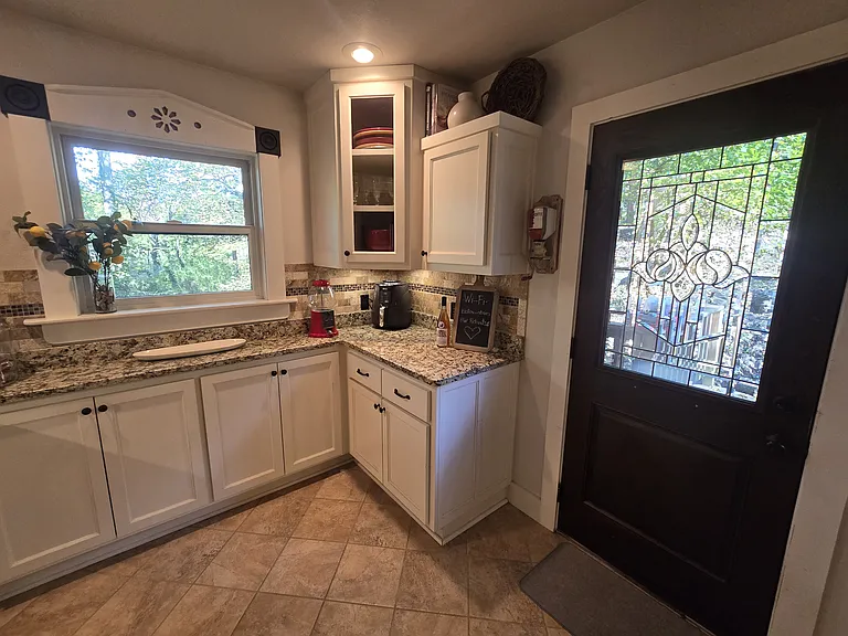 Come home to a large, fully stocked kitchen with a gas stove, refrigerator, microwave, air fryer and so much more.