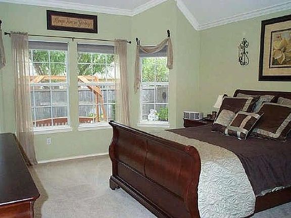 Master bedroom with 2 walk in closets and bay windows