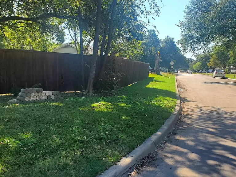 house sits on corner of circle and this is the side yard along the fence.
