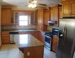 42" Maple Cabinets, SS Appliances and Granite Counters with island
