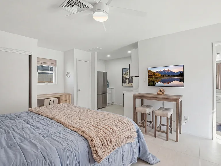 Dedicated workspace and Smart TV _ work or unwind without leaving your room.