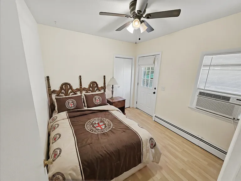 Bedroom B with a Queen-size bed - there is also a desk behind the right corner that is not visible in the photo.