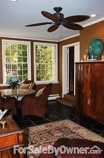 Sunroom : Located off the living room, this sunny room has views of the River.