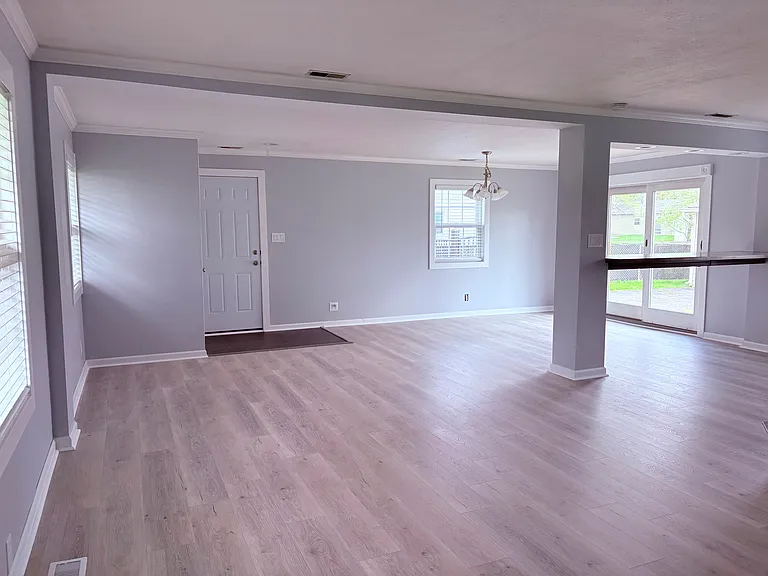 Living Room view, new flooring, new windows, fresh paint
