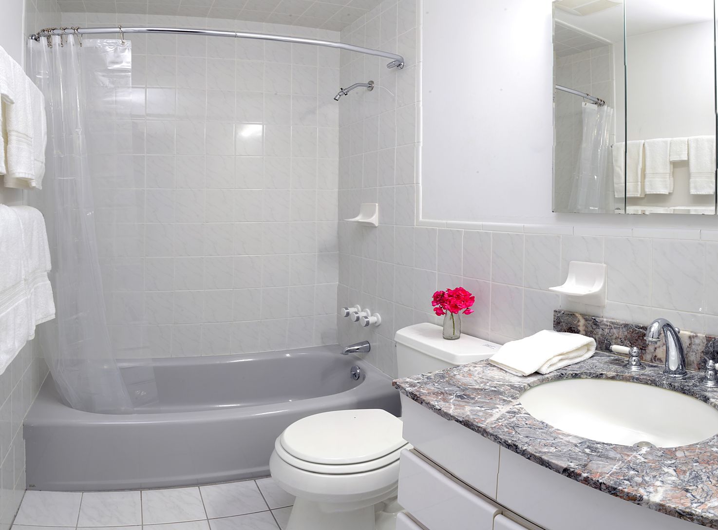Private bath for bedroom one.