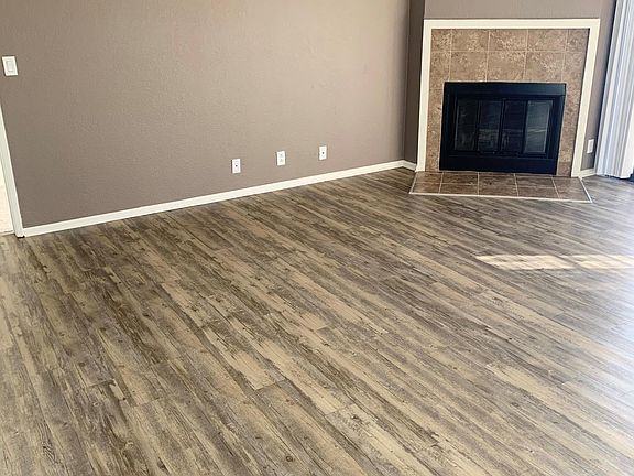 Living Room with Wood Burning Fireplace