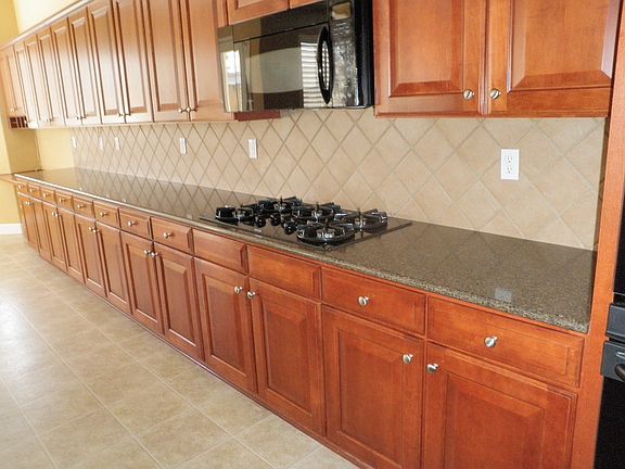 Wall to Wall Custom Cheery Cabinets