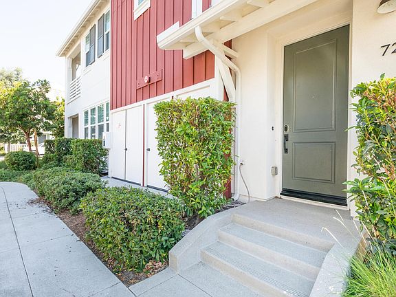 Front door equipped with smart lock and Nest doorbell camera