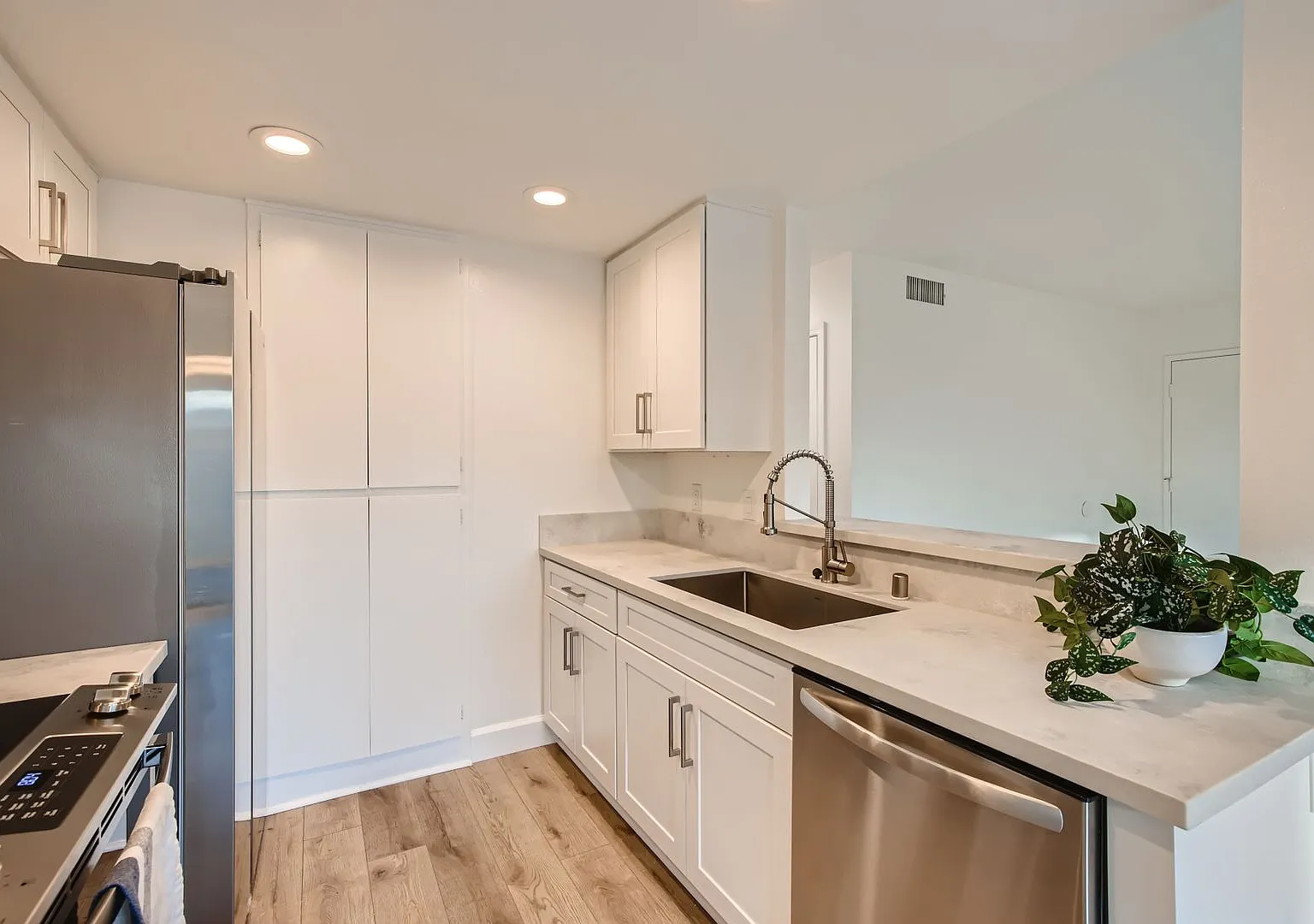 Recently Renovated!! - 3 Bedroom/2 Bath First floor corner unit with 2 car garage and A/C — Photo 2