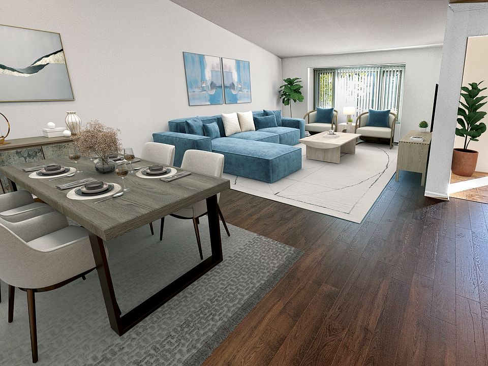 2 &amp; 3 bedroom privacy-loving townhome with uplevel features like hardwood flooring, sleek white cabinetry, sky lights, travertine foyer.