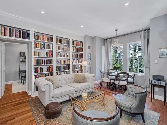 Living room with view into guest bedroom