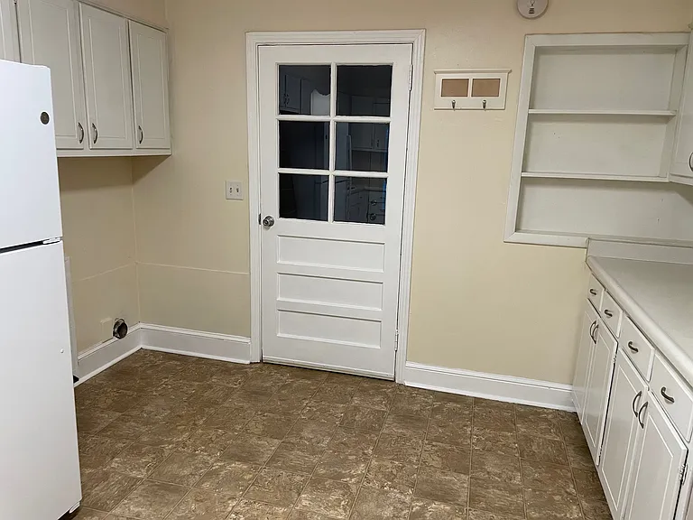 Kitchen - door to mudroom, laundry area, lots of storage and counter space.
