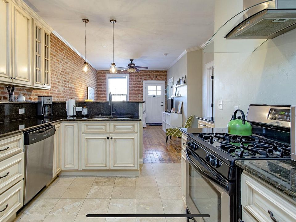 Open kitchen with stainless appliances and plenty of cabinets for storage