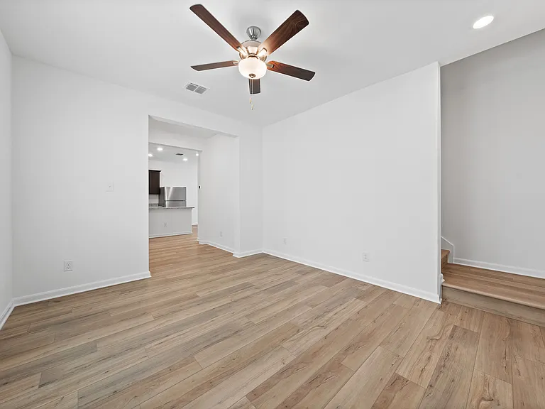 The family room leads to the kitchen and dining room.