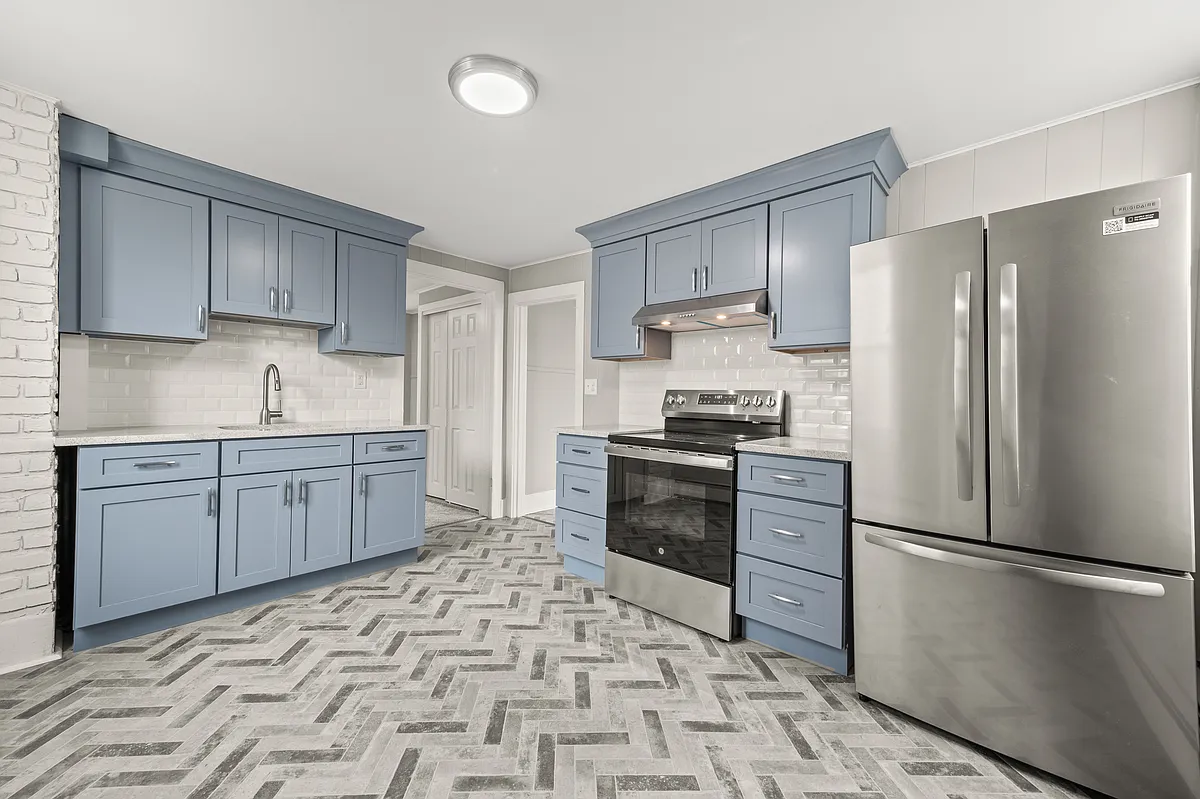 Remodeled kitchen with new appliances. - 103 Maple St #103