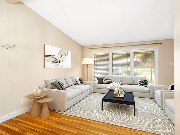 Living room is bright, tranquil, and open.