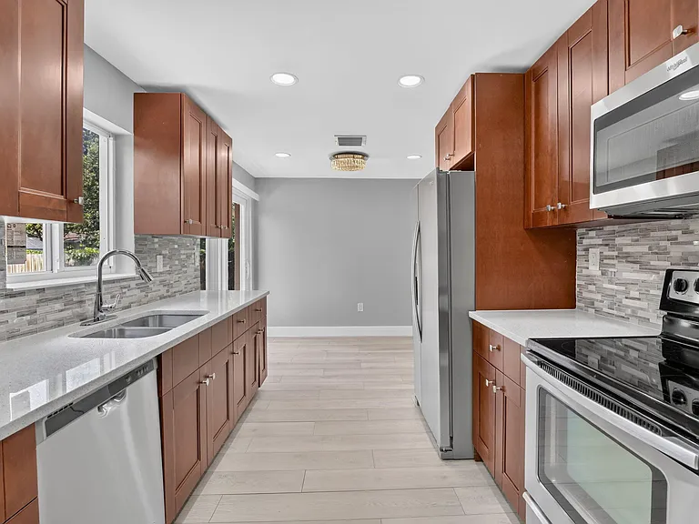 6281 NW 14th Ct — Photo 11