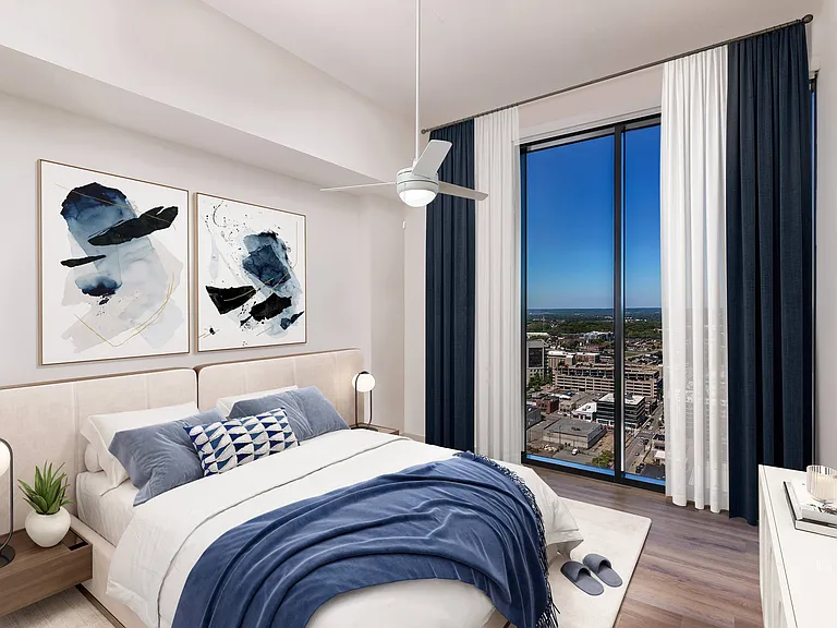 Spacious Penthouse Bedroom with Floor-to-Ceiling Windows
