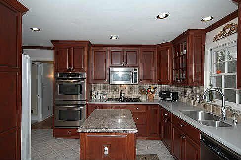 Cherry Cabinet/Stainless Kitchen