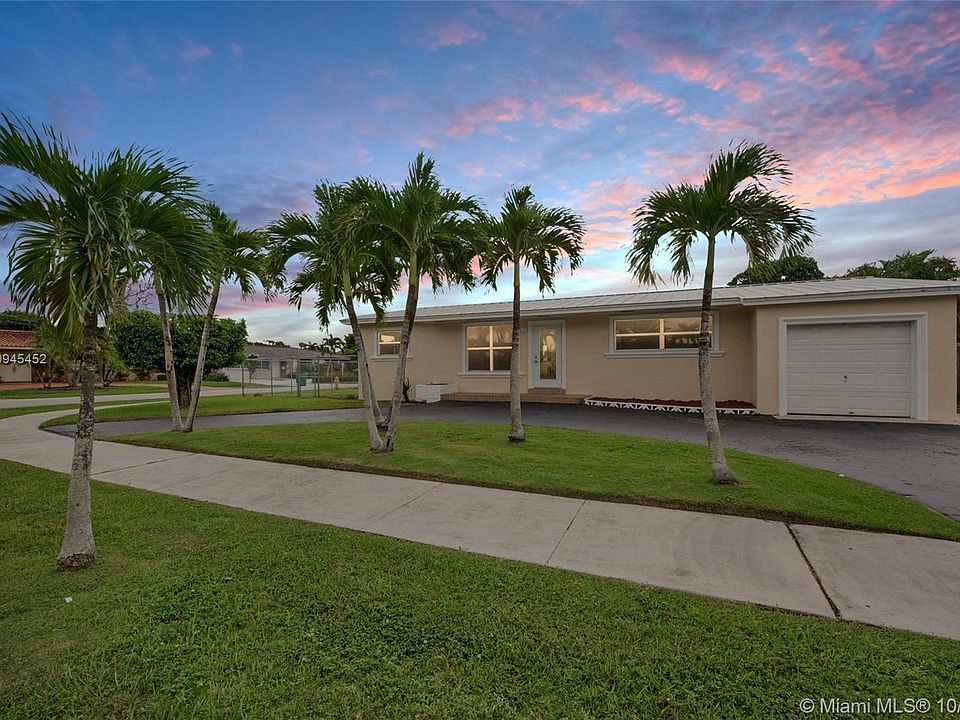Lovely corner lot with circular drive and one car garage