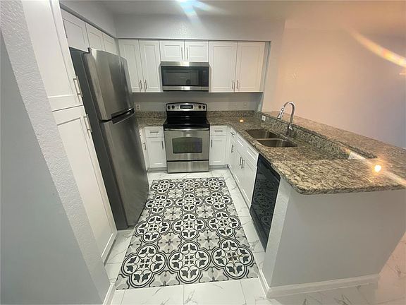 5th image of 13838 FAIRWAY ISLAND DRIVE #1413