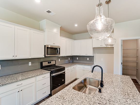 Photo representation of the Gaines plan. Colors, finishes and options will vary.