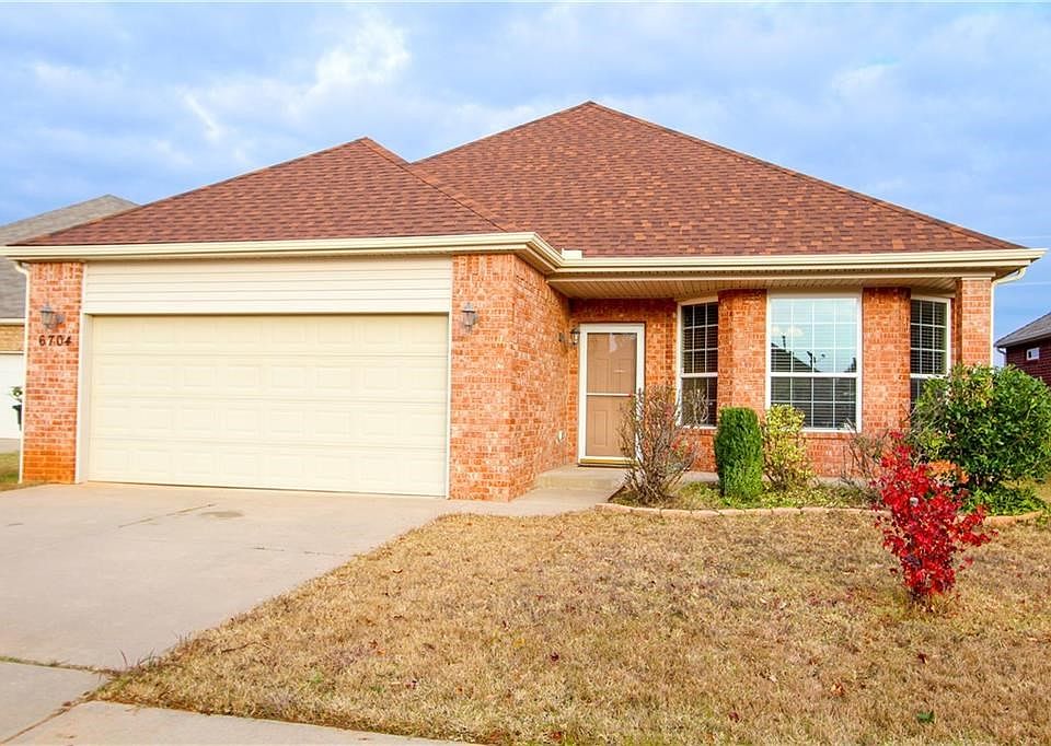 3 bed/2 bath home with STORM SHELTER and covered patio just minutes from Tinker or downtown OKC! Gorgeous real tiger-wood wood floors in entry, dining, hall and living. Bay window in dining. Fireplace in living. Breakfast bar, pantry, gas stove in kitchen. Wonderful master w/ full bath & linen closet. Large fenced backyard with covered patio.