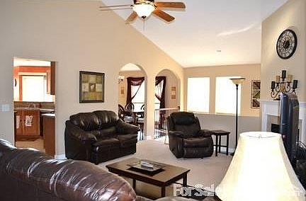 Living room with vaulted ceiling