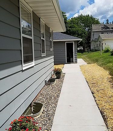 Sidewalk from front to back alley