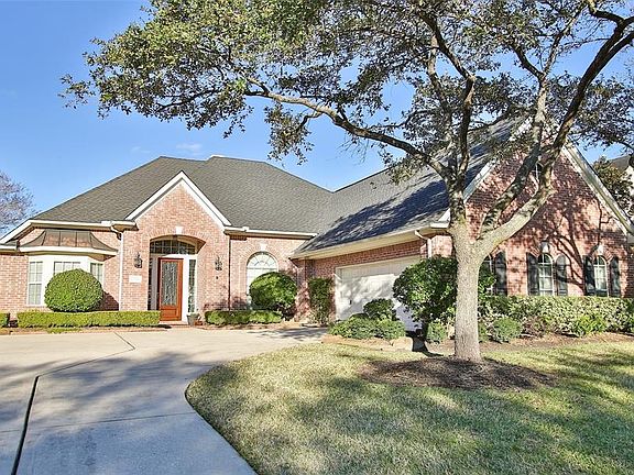 Your guests with have enough room to park their cars on the extra wide driveway leading to the garage.