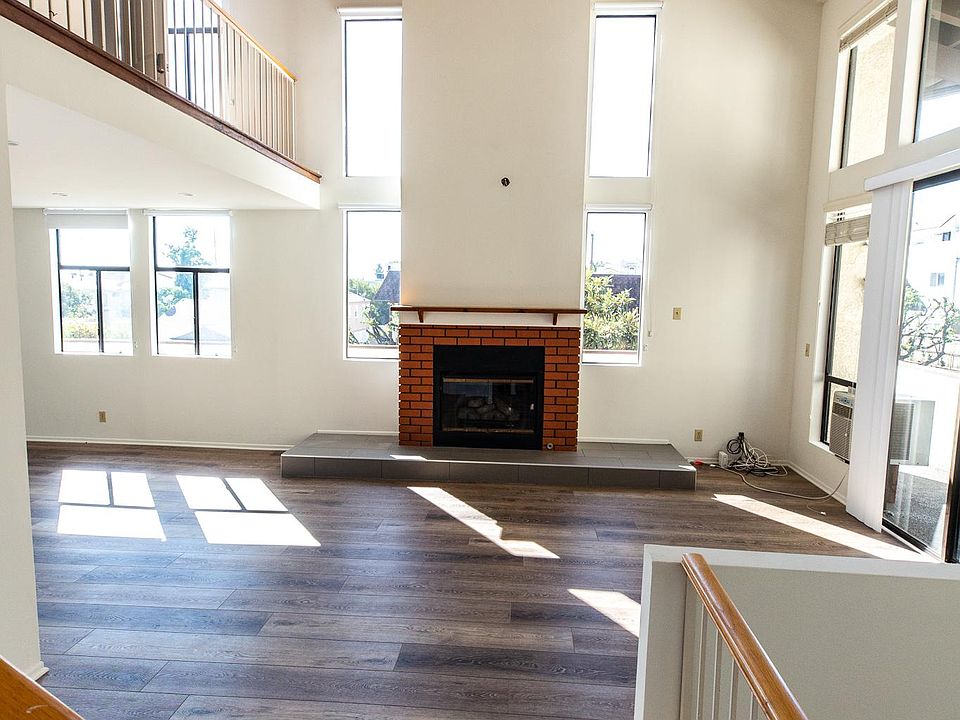 Living Room, second floor. Ample light. West facing sunset view windows.