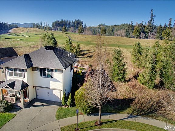 Nestled on a private cul-de-sac and backs to the 16th hole of The Club at Snoqualmie Ridge.