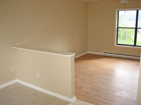 Open Floor Plan, Dining Room with Tile Floor, Den with Laminate Hardwood Floor