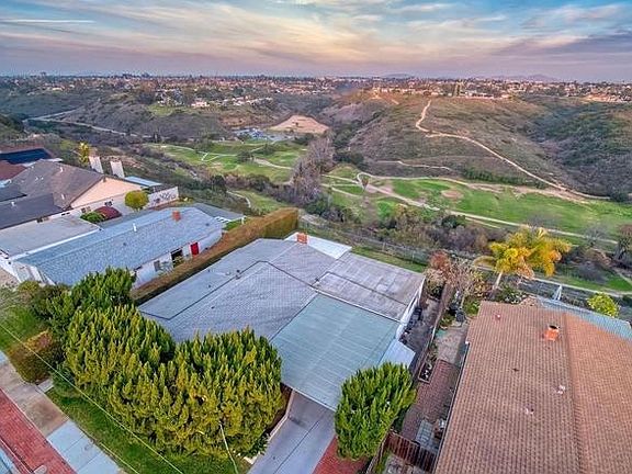 Trees are not longer in front of house, but picture shows location on Tecolote Canyon.