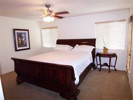 Exquisite master suite features walk-in closet, private open lanai and