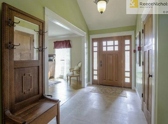 ENTRY w/NEW TILE, CEILING, & LIGHT FIXTURE!