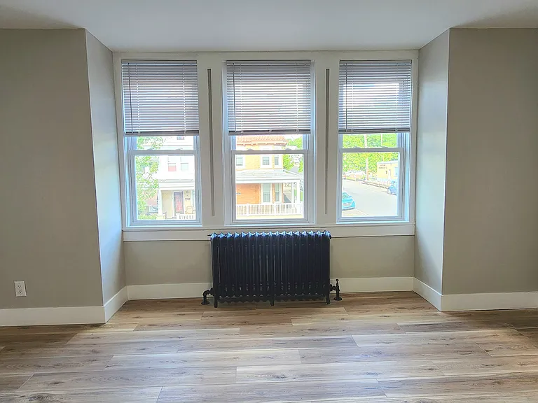 Main bedroom located at front of home. Angle 3.