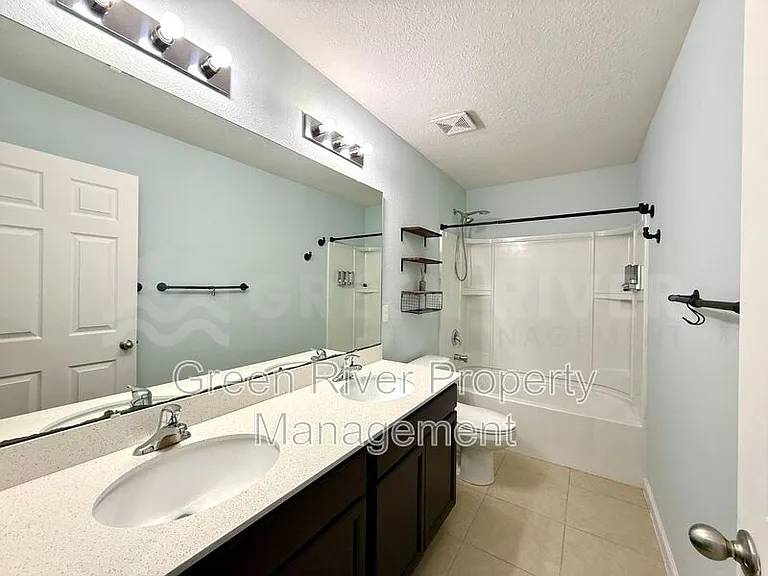 8704 Lake George Cir W — Photo 21